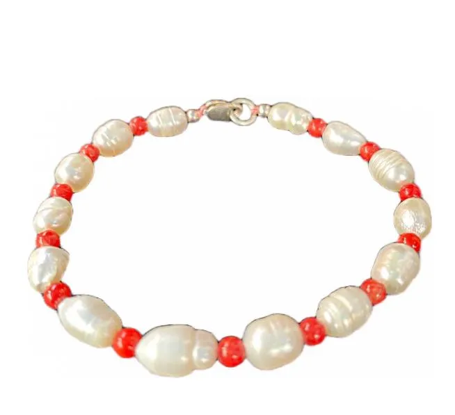 Bracelet of river pearl, red coral and silver clasp